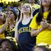 Michigan sophomore Lauren Jbara (second to the left) watches with friends during the watch party at Crisler Arena on Monday, April 8. Daniel Brenner I AnnArbor.com